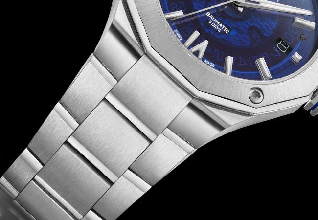 名士BAUME & MERCIER Riviera Baumatic透明煙燻藍色自動腕錶