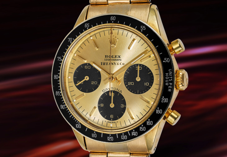 紐約富藝斯鐘錶拍賣品之一，勞力士「Daytona」型號 6264，14K 黃金計時鏈帶腕錶，備香檳色錶盤，由蒂芙尼銷售，約 1971 年制。估價：200,000 - 400,000 美元